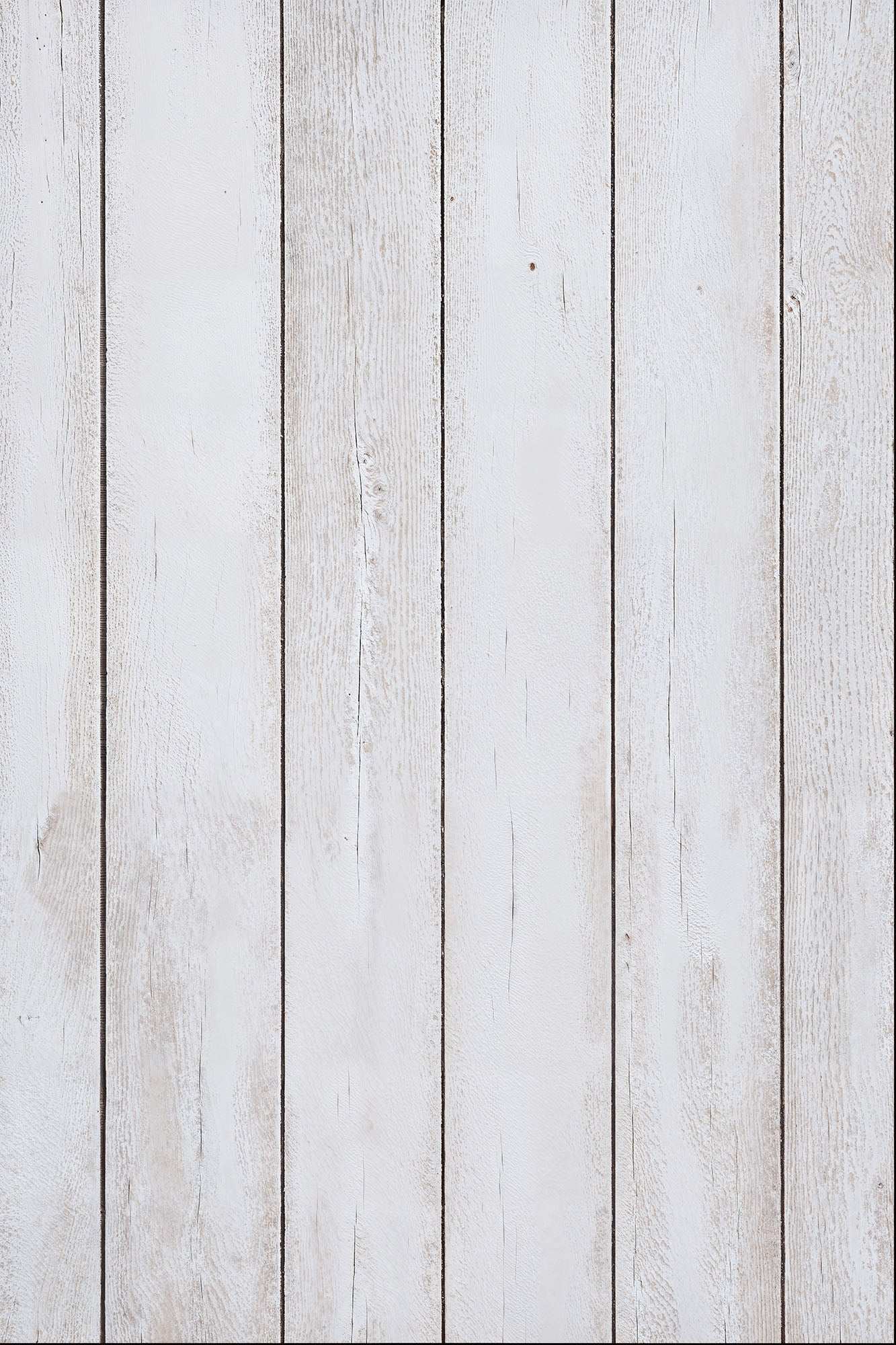 Whitewashed wood plank backdrop with rustic, weathered texture.