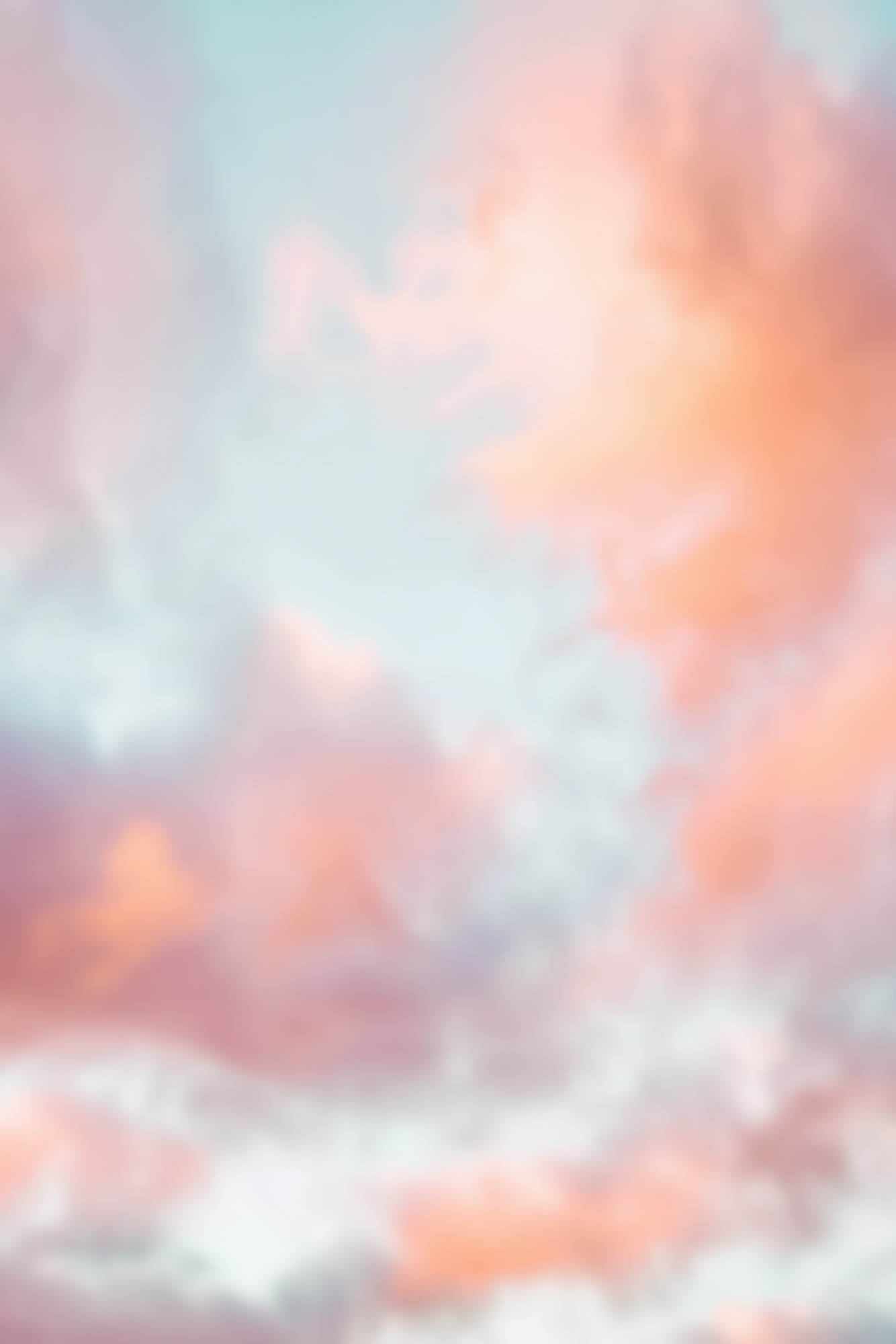 Serene sky with soft pink and blue hues, ideal for dreamy photography.