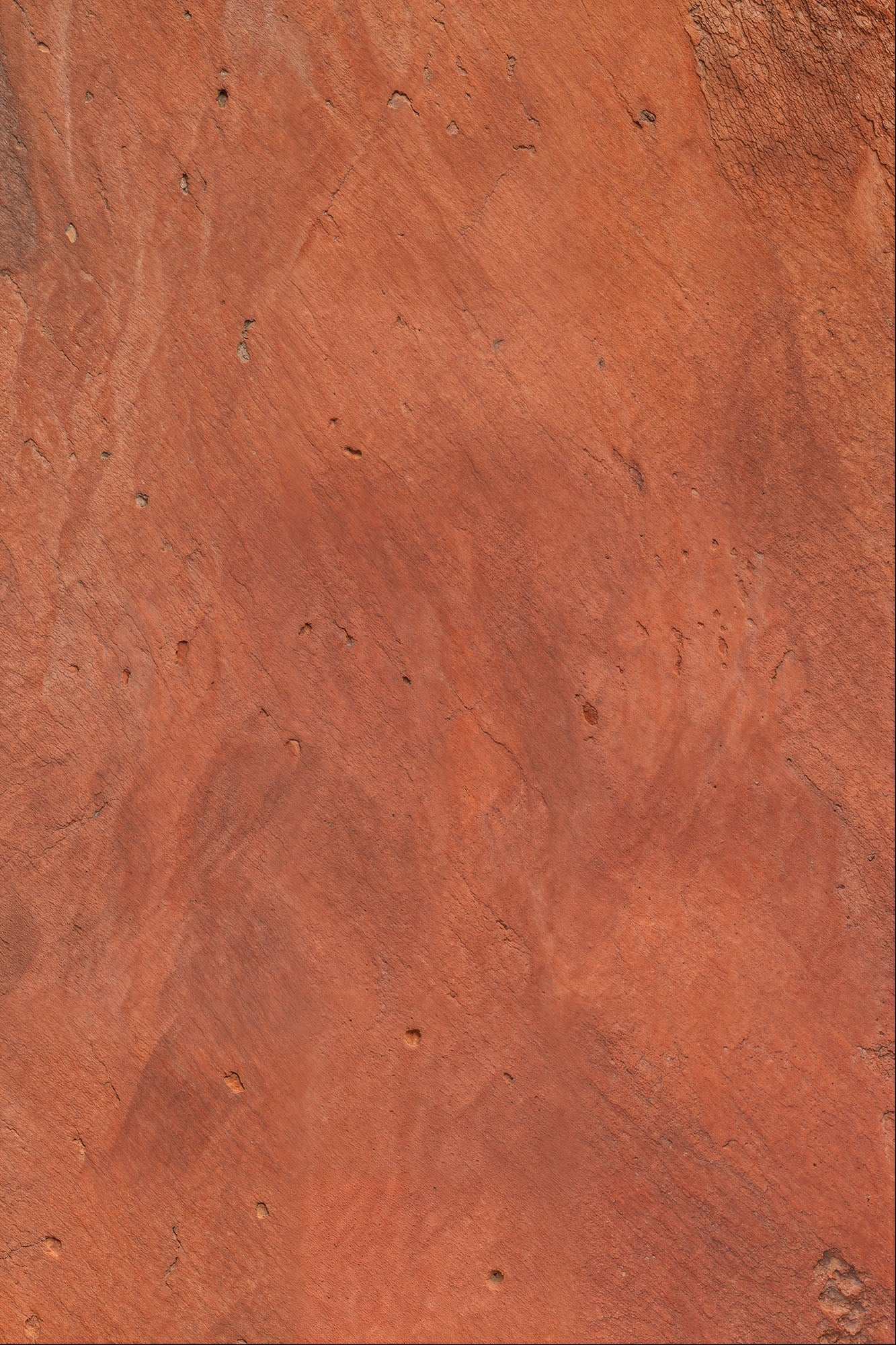 Rustic Ember textured terracotta backdrop with sunbaked adobe appearance.