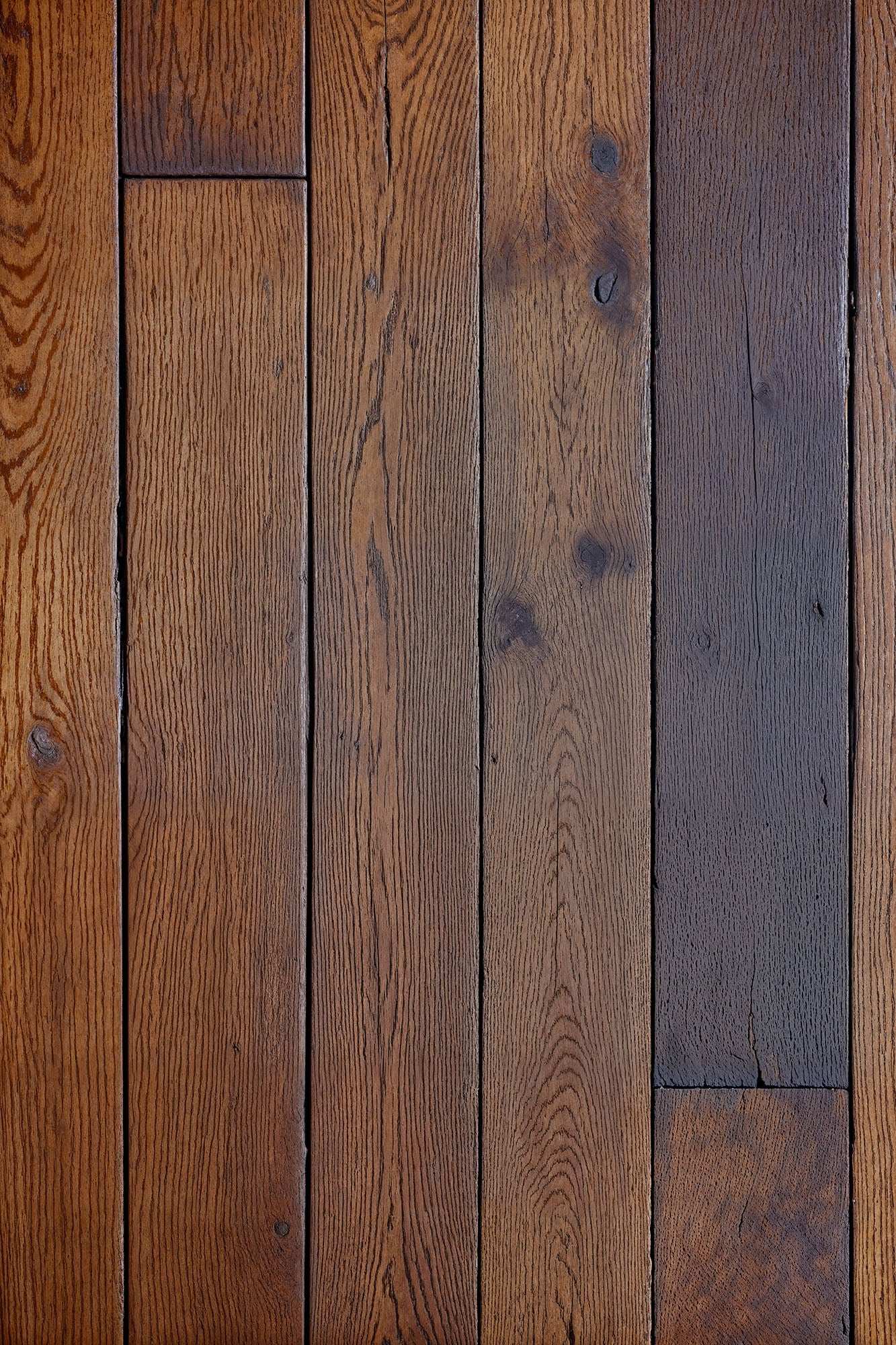 Richly textured saloon floor wood backdrop with aged oak planks and rustic charm.