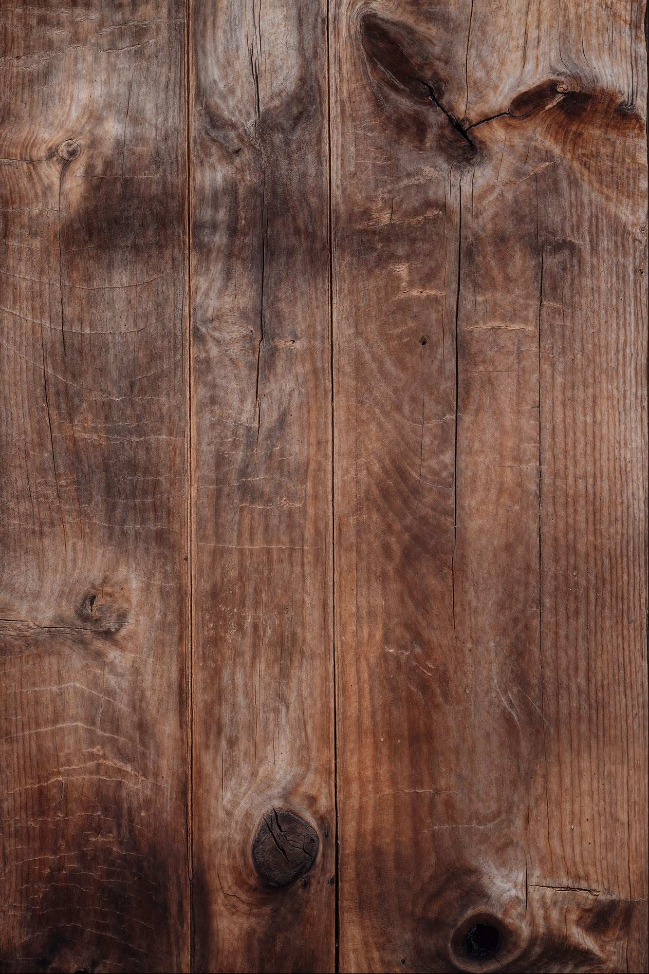 Weathered Timber backdrop with rich tones and natural grain for rustic photography ambiance.