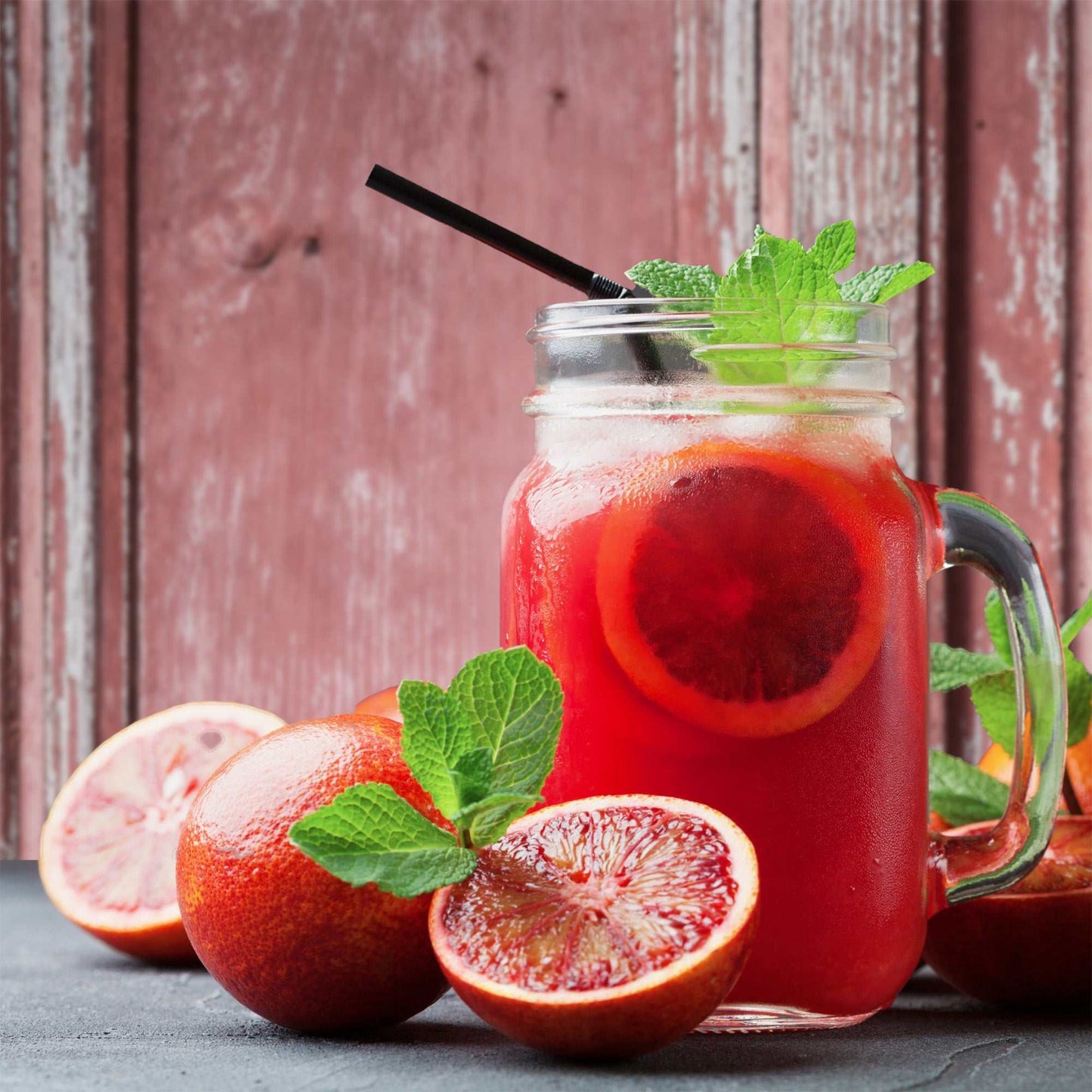 Faded Blush vintage pink wood backdrop with cocktail and blood oranges.