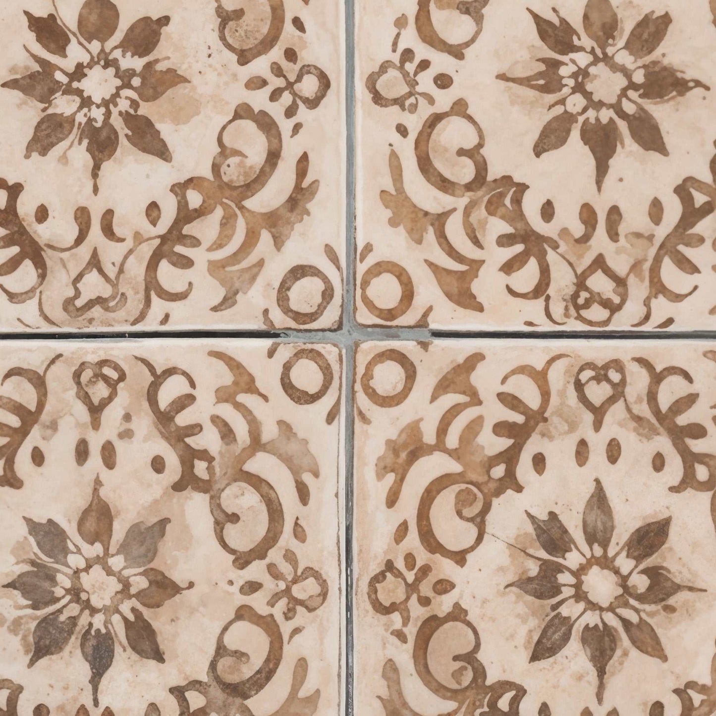 Hand-painted antique tiles with intricate floral patterns, perfect for vintage photography backdrop.