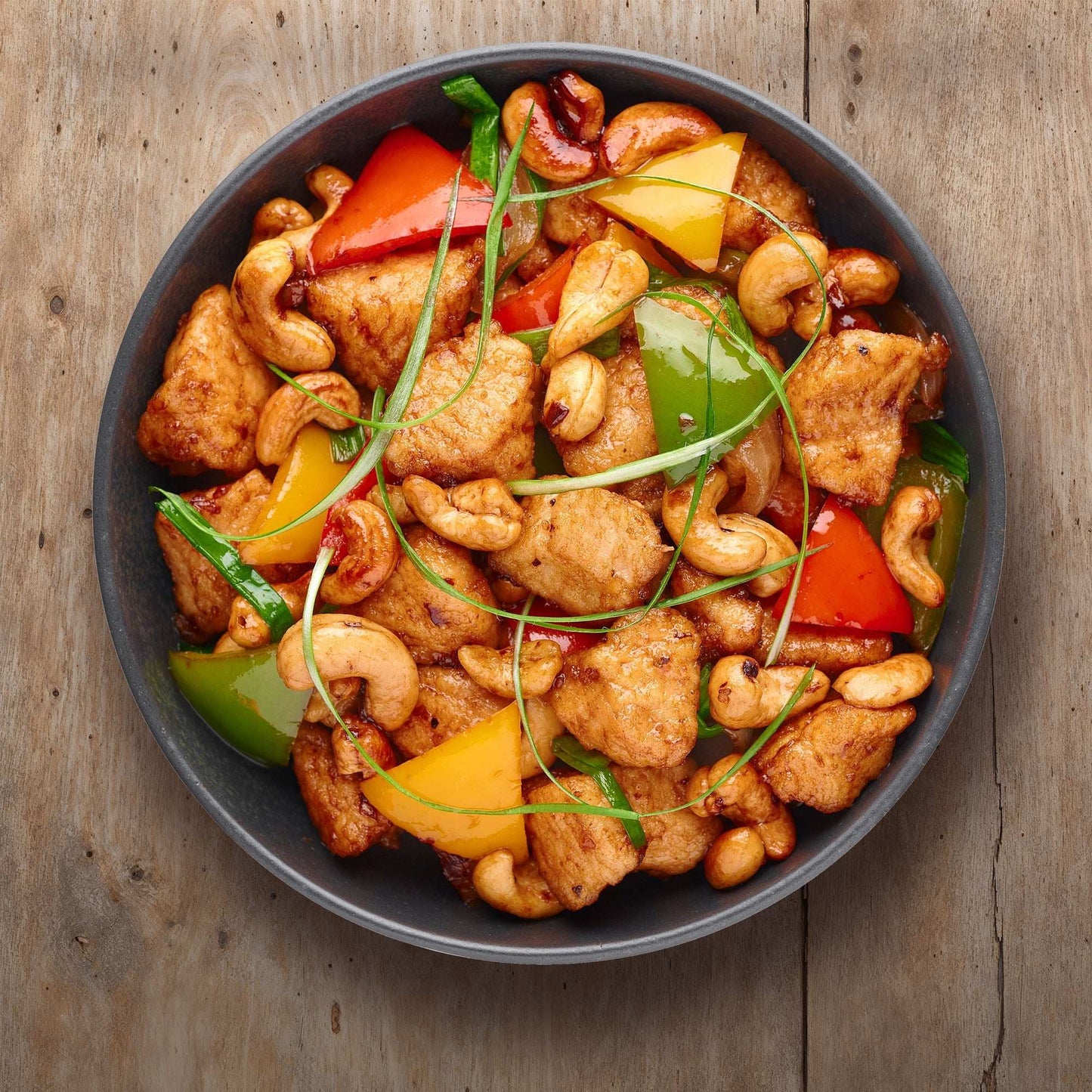 Country Planks rustic wood background for food photography showcasing colorful stir-fry dish.