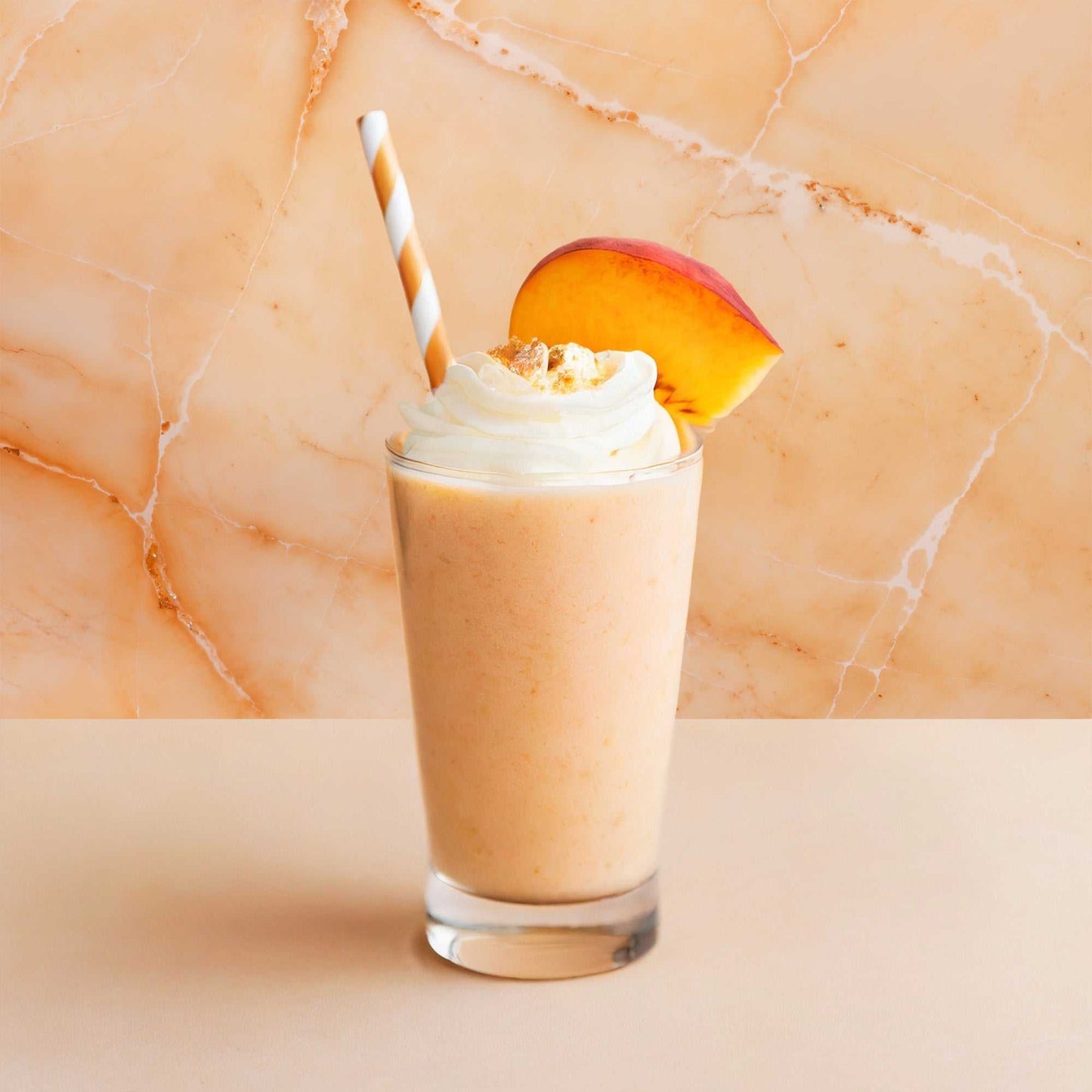 Creamsicle backdrop with orange and cream marbled patterns evoking warmth and nostalgia.