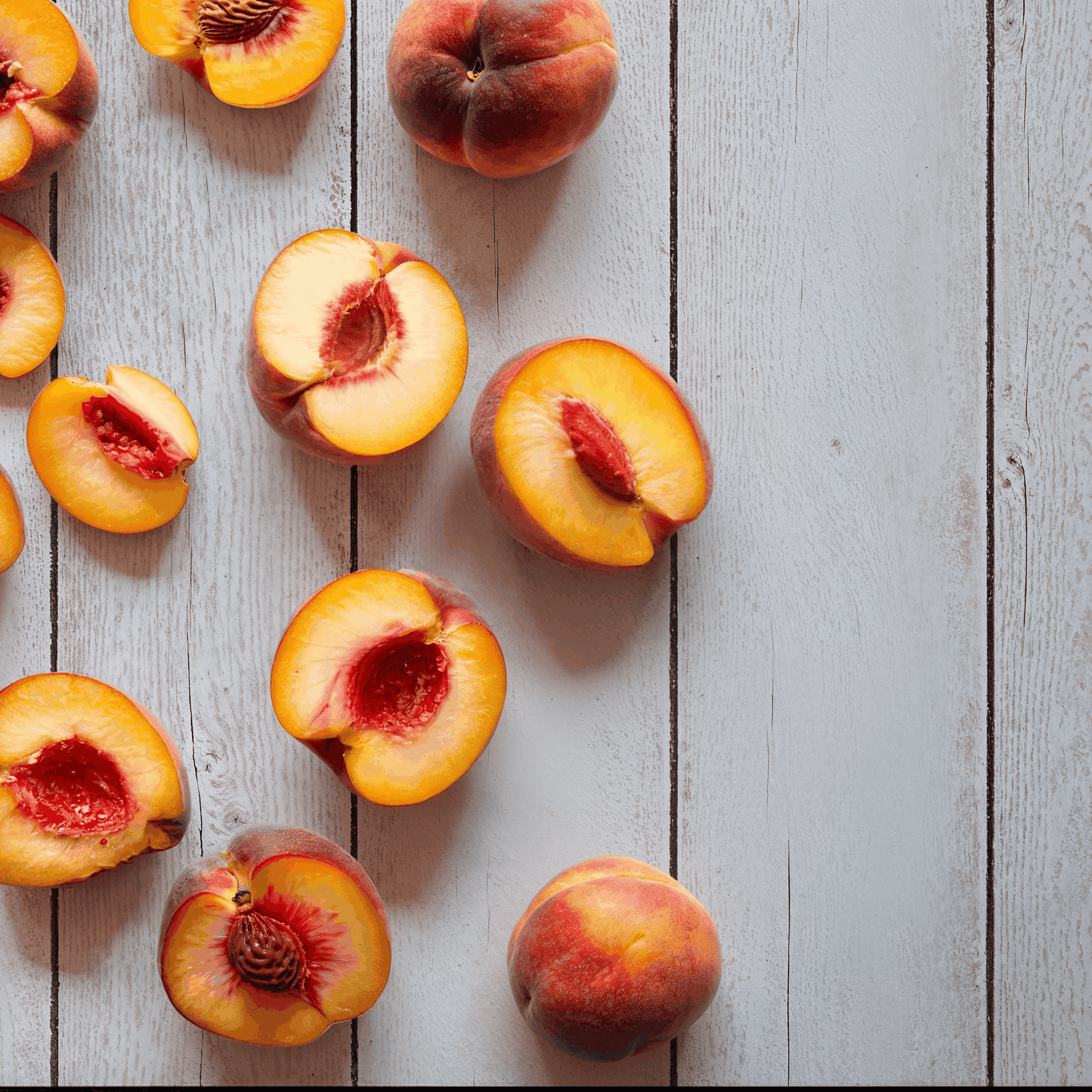 whitewashed wood plank with fresh peaches