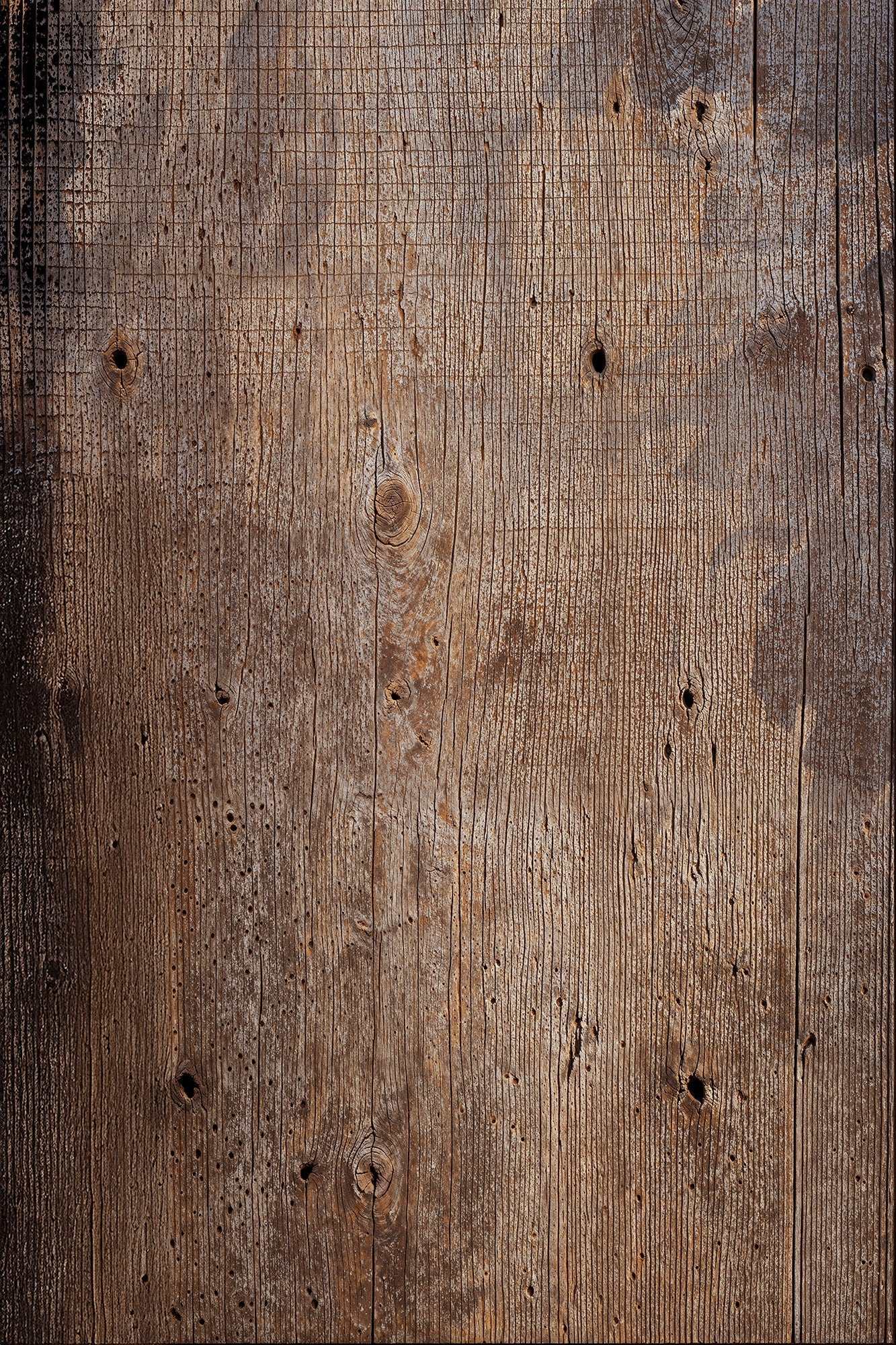 Vintage timber backdrop with rustic, weathered wood texture showcasing deep grains.